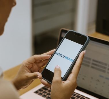 World Reach marketplace app on screen
